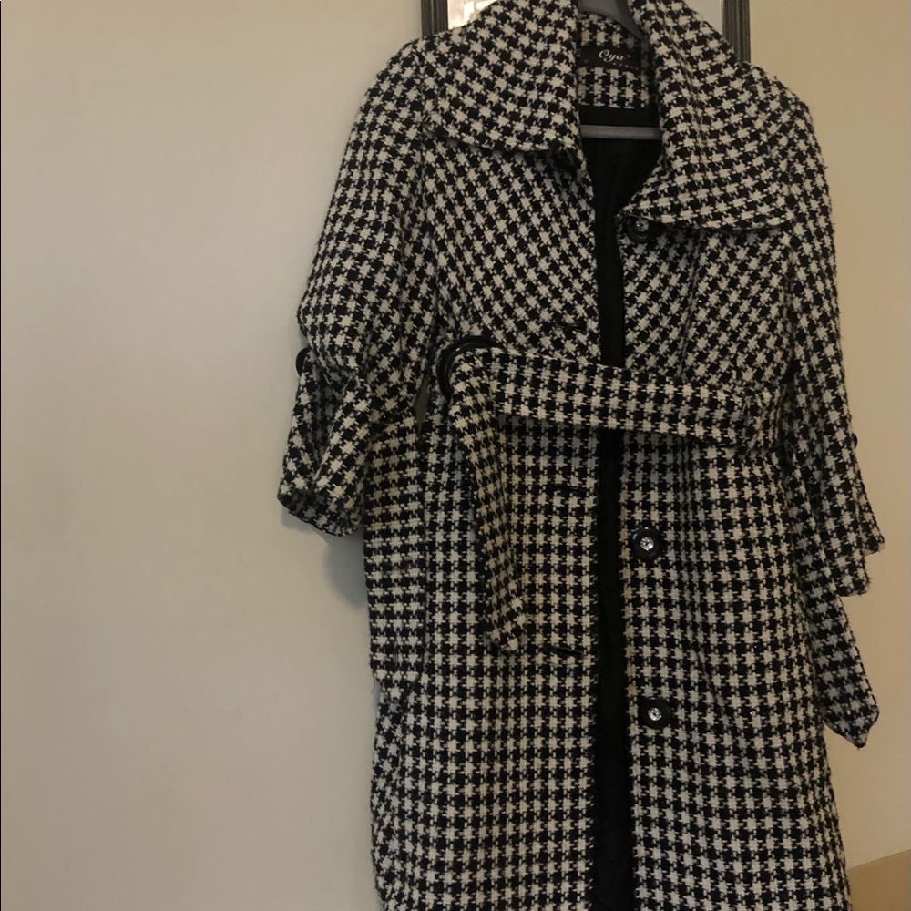 Long (below knee) black and white checkered coat from Paris
